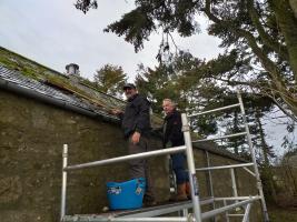 YVR members clean the gutters at the Ythanbank Community Hall